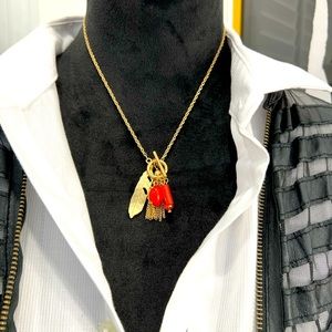 Gold Toggle Clasp Necklace with Feather and Other Charms